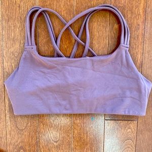 Athleta sports bra with crisscross straps. Dusty burgundy in size small. EUC